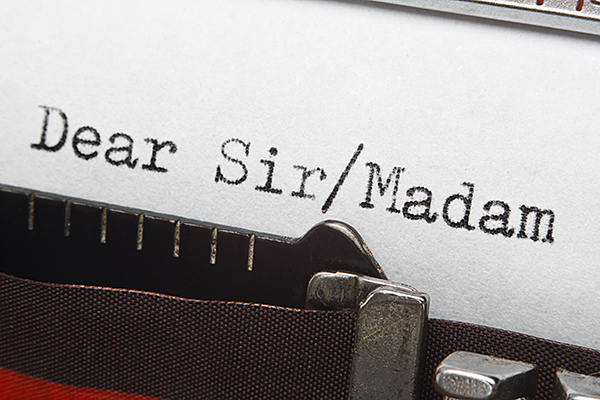 Typewriter typing Dear Sir or Madame